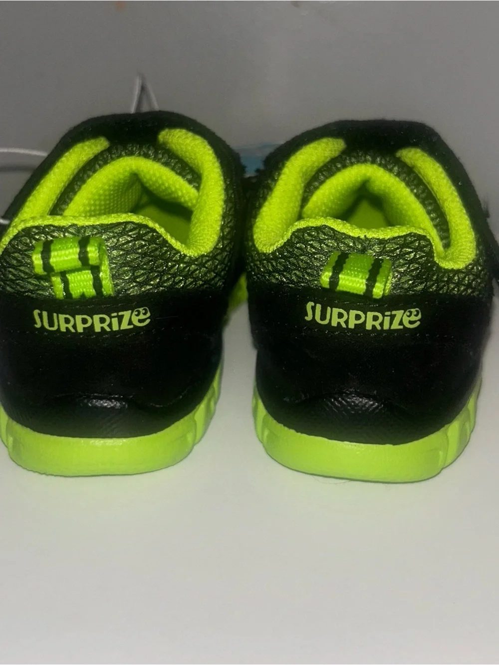 Stride Rite Kids Light-Up Sneaker in Neon Green and Black